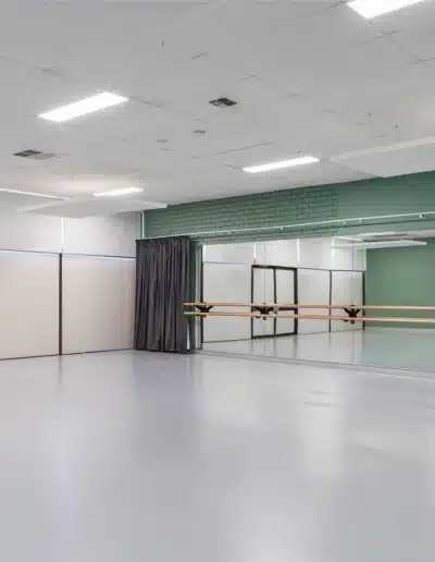 Contemporary Dance Studio With Green Accent Wall And Mirrors Contemporary Dance Studio With Green Accent Wall And Mirrors